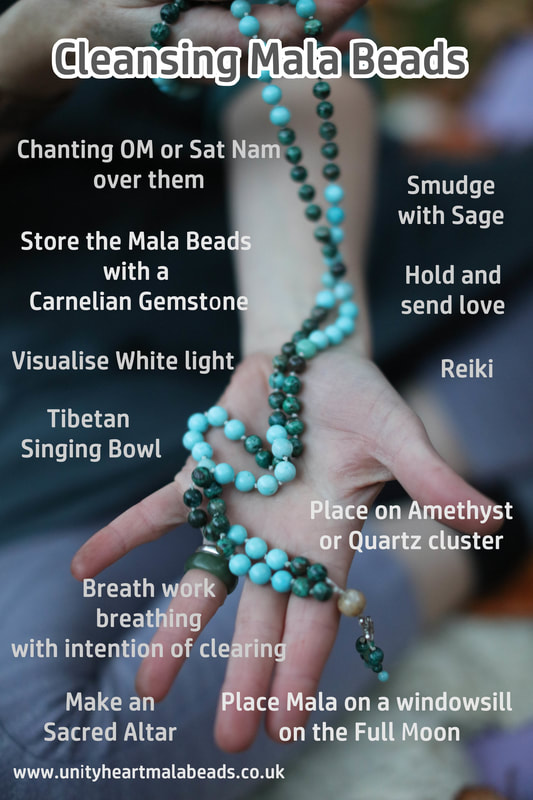 picture for ideas on how to cleanse your mala beads using, sound, sage, carnelian, love reiki, the moon